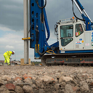 Employee carrying out piling and foundation works